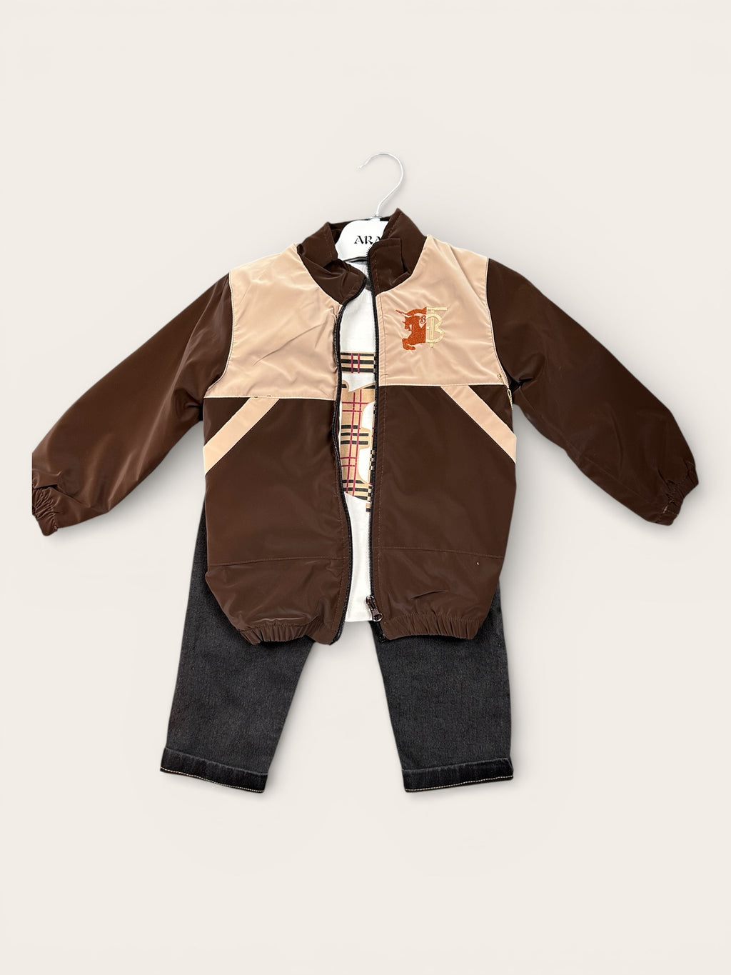Two tone jacket, jeans and long sleeve shirt