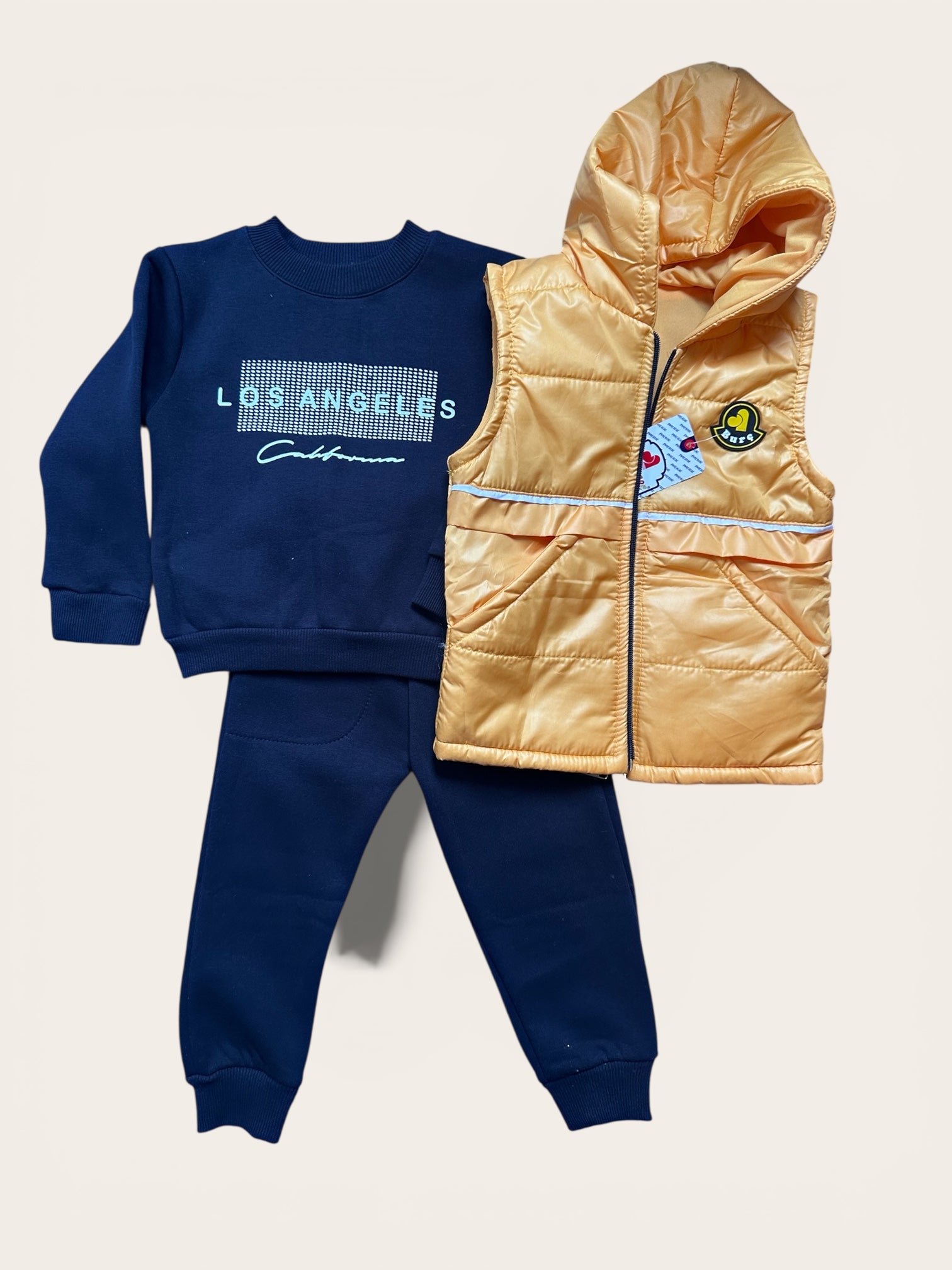 Body warmer, sweater and soft jogging pants