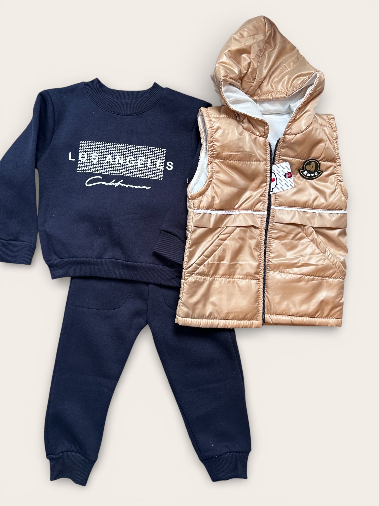 Body warmer, sweater and soft jogging pants