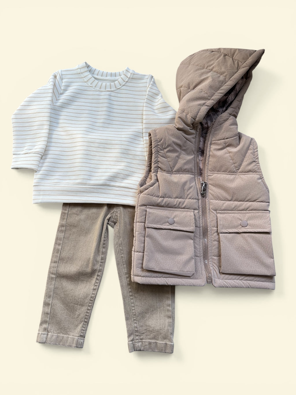 Body warmer, jeans and long sleeve shirt