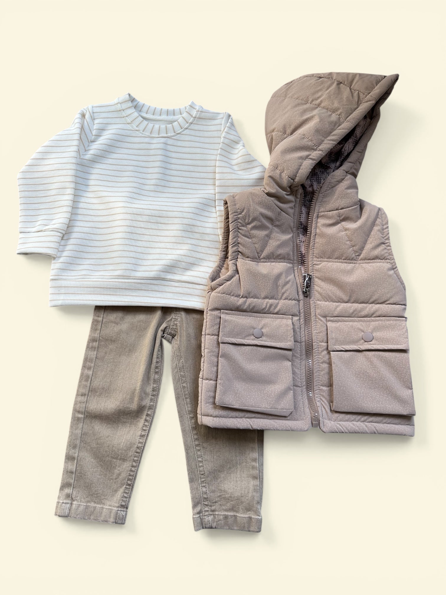 Body warmer, jeans and long sleeve shirt