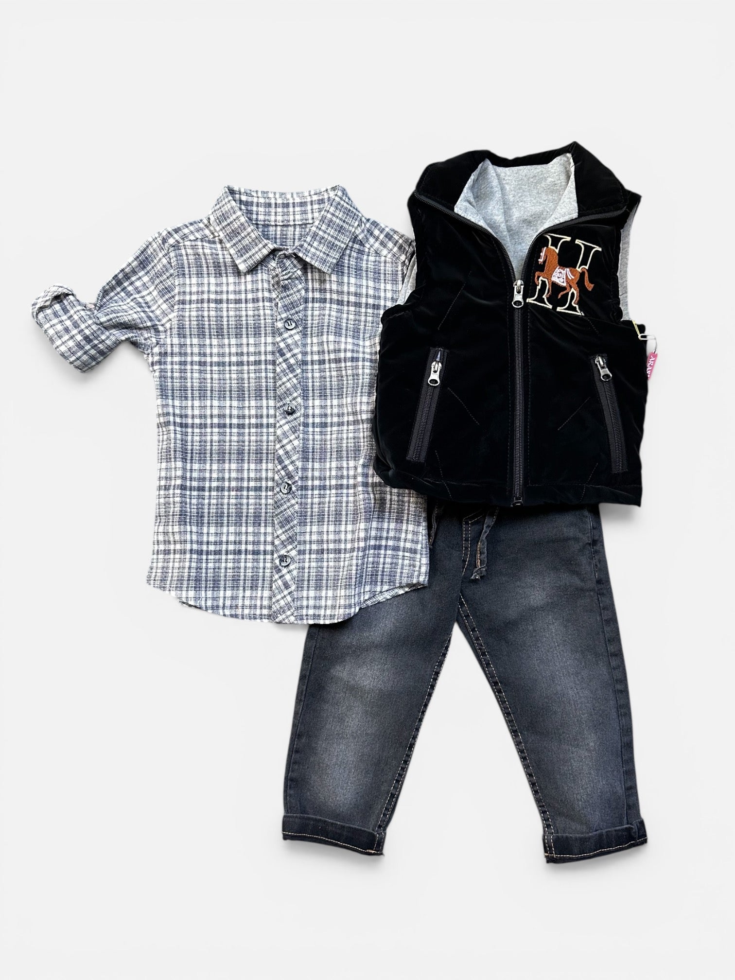 Boys - bodywarmer, jeans and casual shirt.