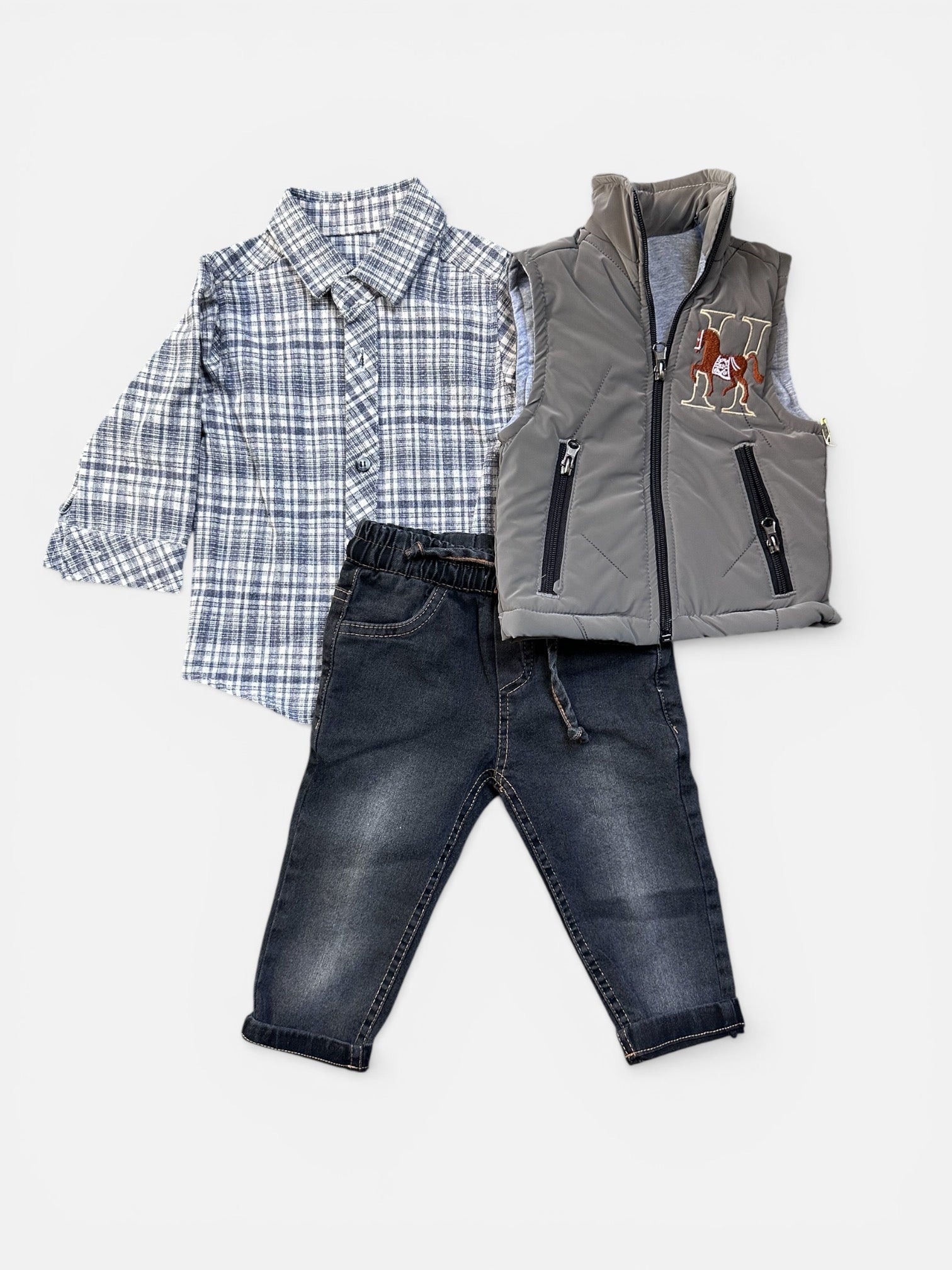 Boys - bodywarmer, jeans and casual shirt.